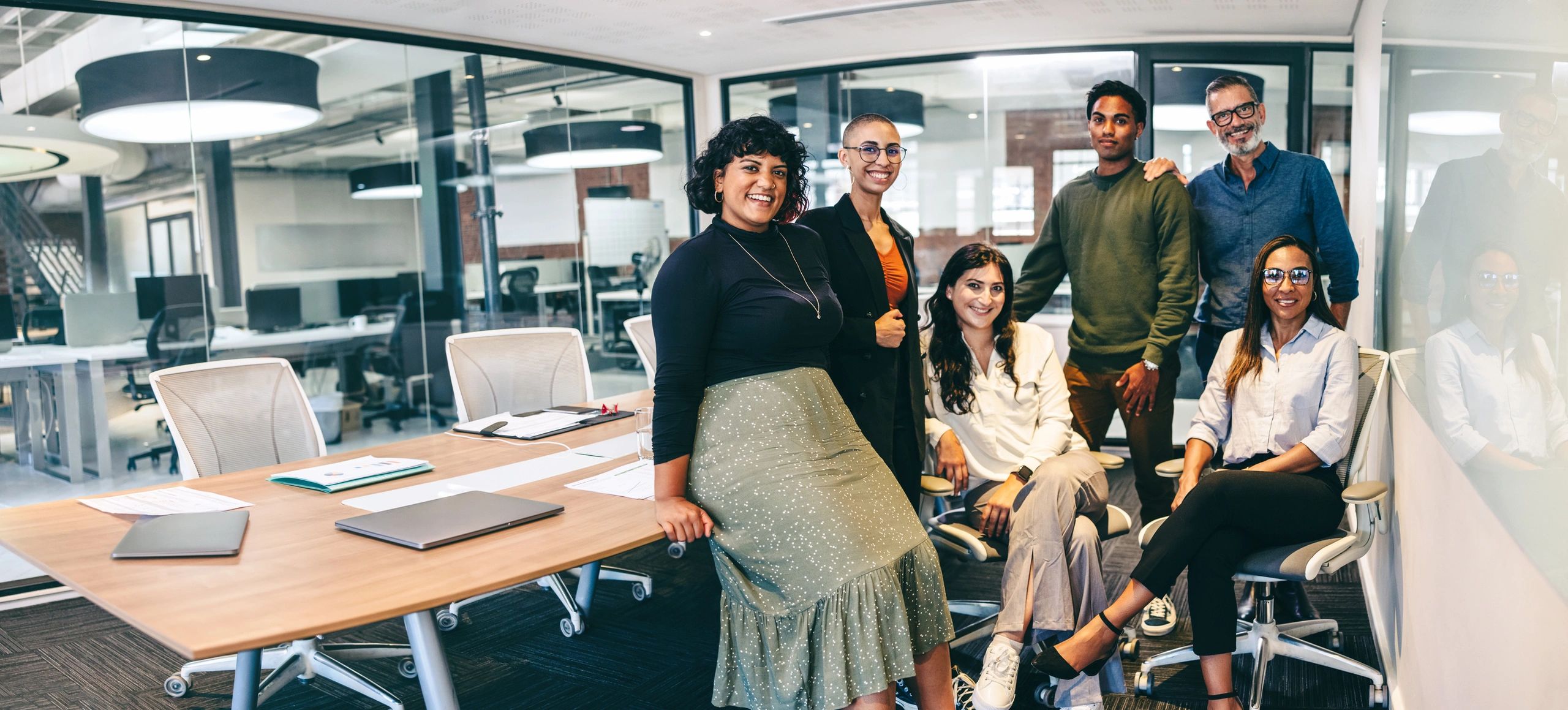 diverse nonprofit research team modern office