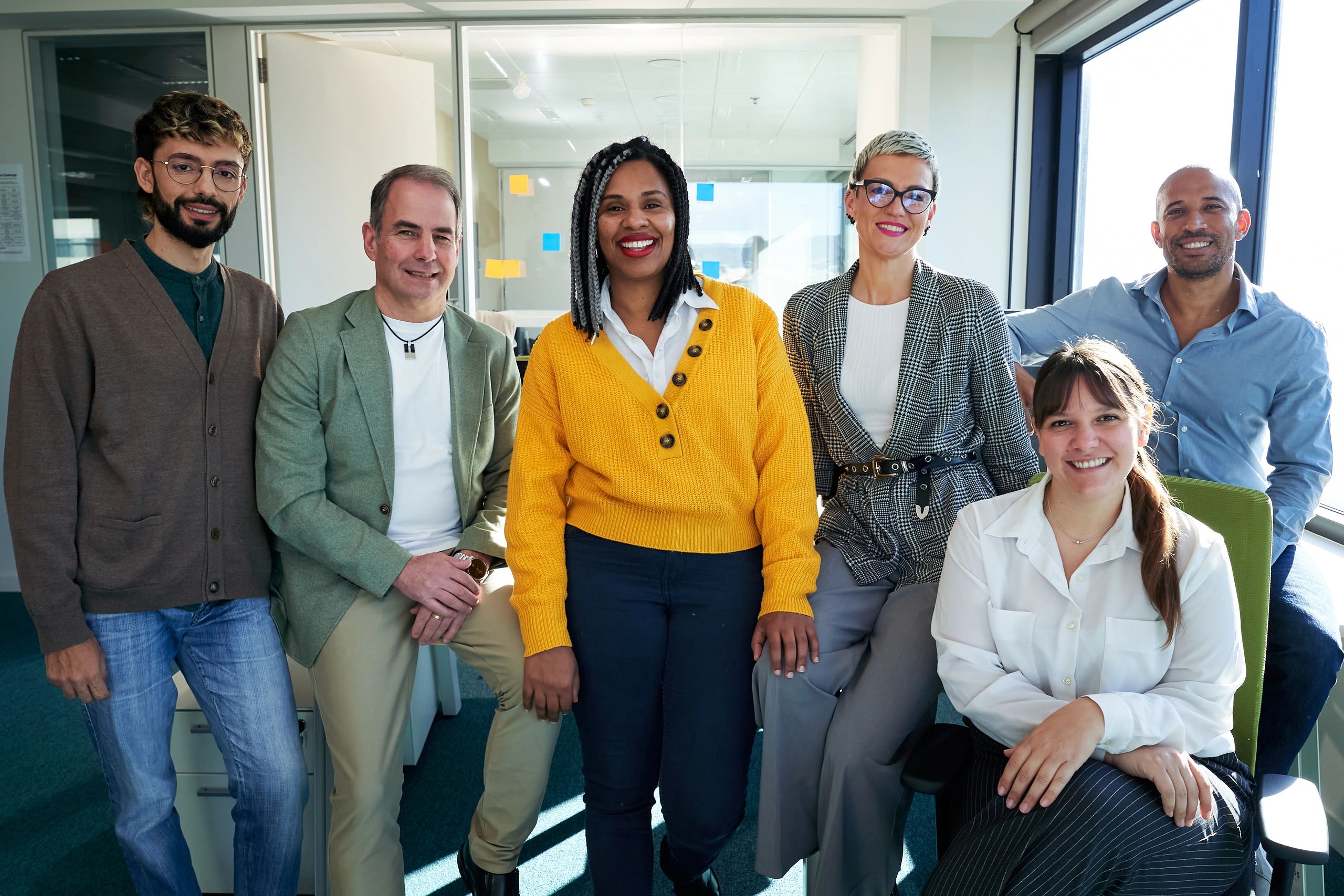 diverse nonprofit research team modern office